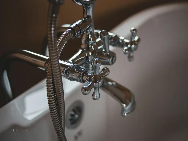 Chrome faucet with cross handles